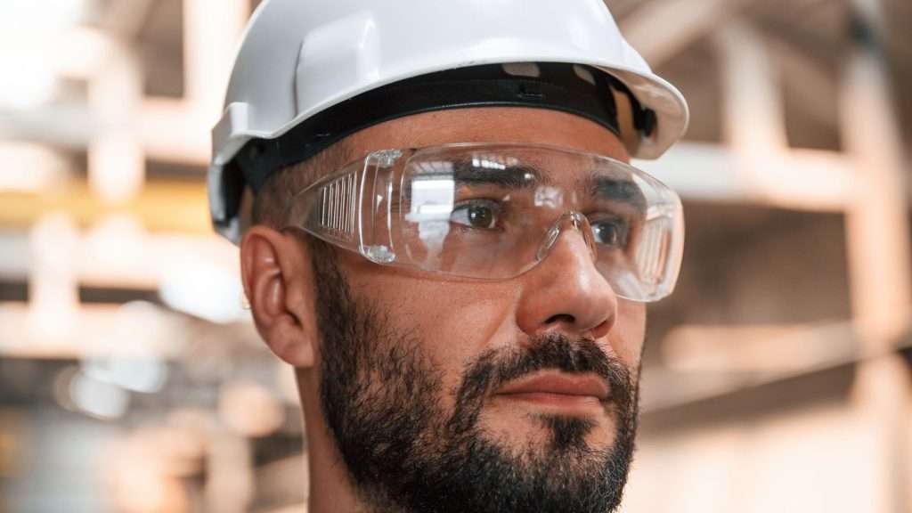 Portable appliance testing engineer in PPE